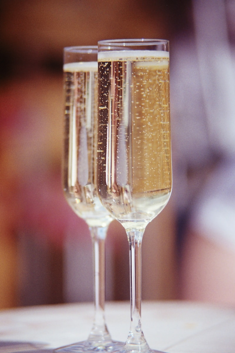 clear wine glass with brown liquid